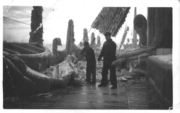 Chipping ice from the City of Flint