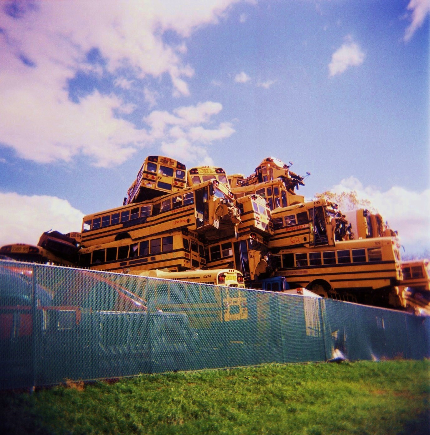 School Bus Heap by squareforever