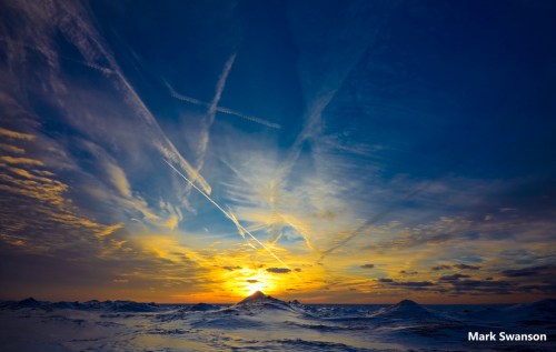 Contrail Sunset by Mark Swanson