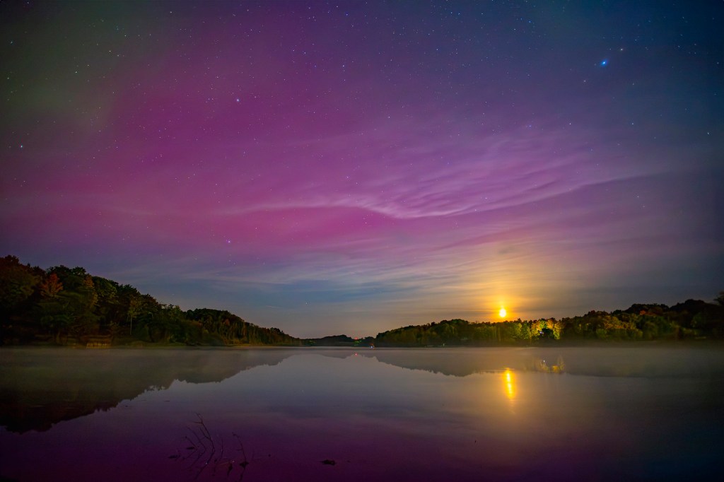 Moon set under Aurora by Thomas Mann