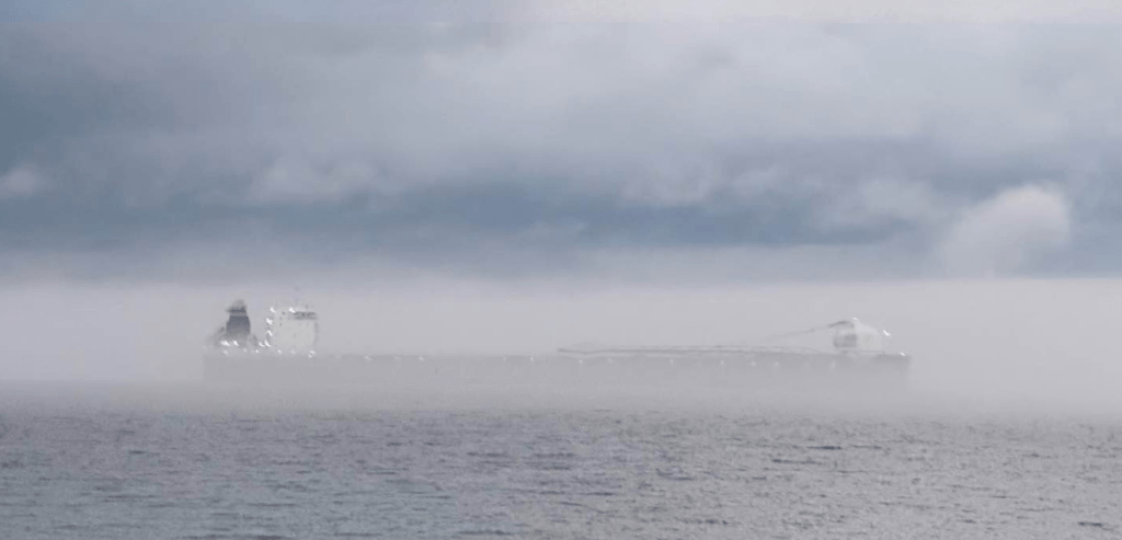Freighter in the Straits of Mackinac in Fog by Joe Lieghio