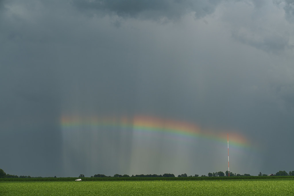 Anti-Crepuscular Rays and Rainbow by Jamie A. MacDonald