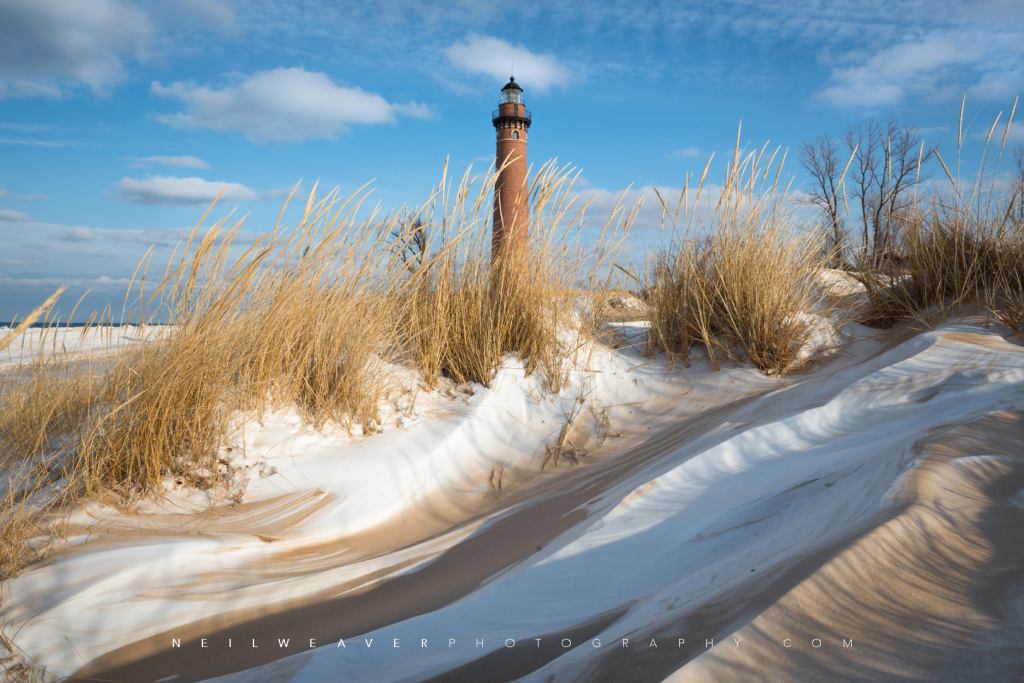 Sand and snow at Little Point Sable Lighthouse by Neil Weaver Photography
