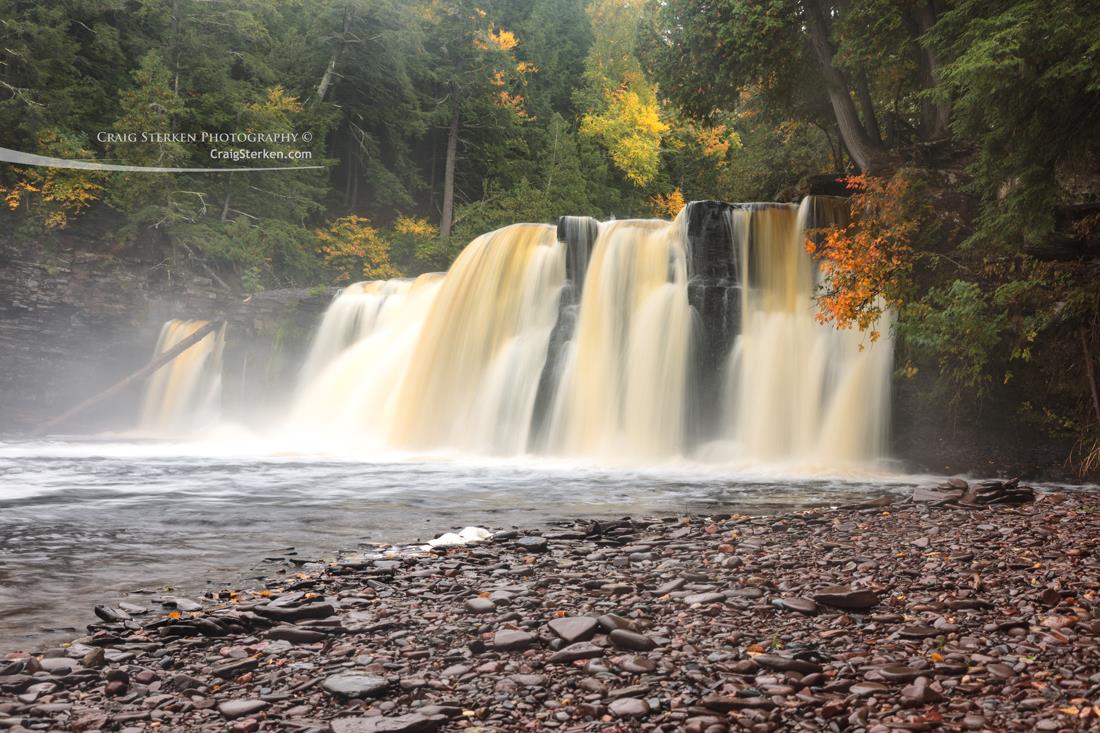 Manabezho Falls on the Presque Isle River by Craig Sterken